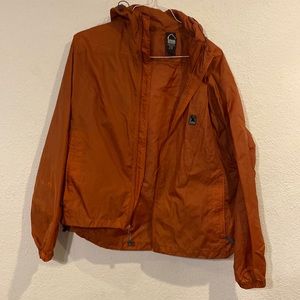 Mens Sierra XL windbreaker. Slight discoloration on the right arm/wrist.